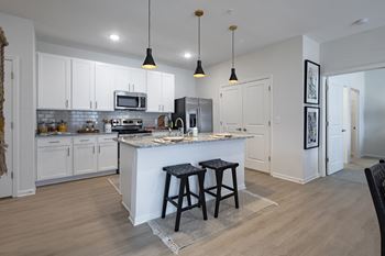Designer inspired kitchen with granite countertops